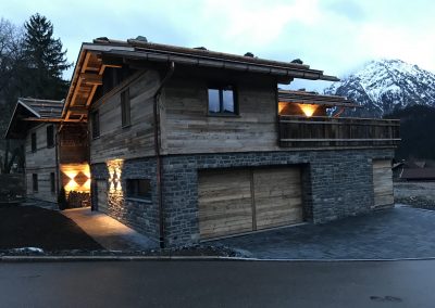 Naturstein Geopietra Holzhaus Berge von ks-ofenbau